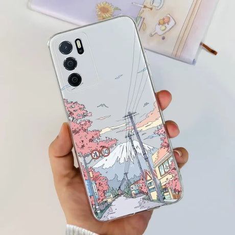 a woman holding a phone case with a drawing of a city