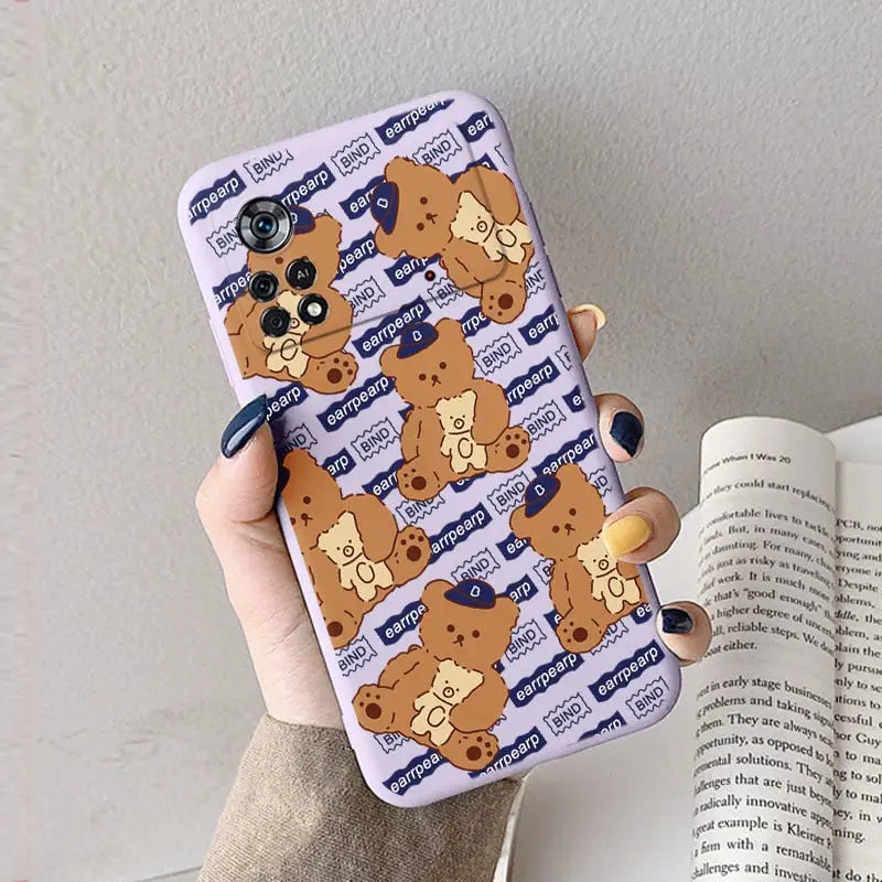 a woman holding a phone case with a dog pattern