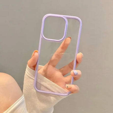 A woman holding a phone case with a finger