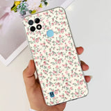 a woman holding a phone case with a floral pattern