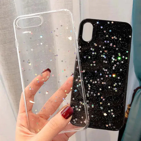 A woman holding a phone case with glitter stars on it