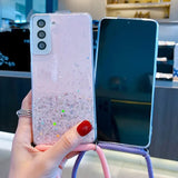 a woman holding a phone case with glitter on it