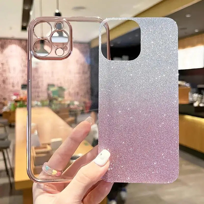 a woman holding up a phone case with glitter on it