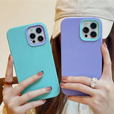 a woman holding a phone case in her hands