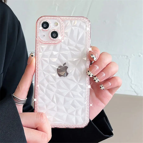 a woman holding a phone case with a heart on it