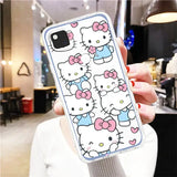 a woman holding a phone case with hello kitty