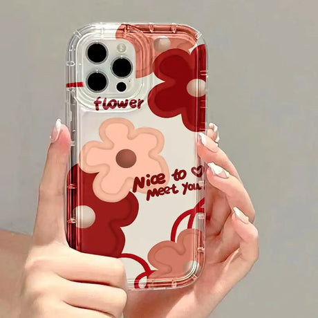 A woman holding a phone case with mickey mouse faces