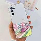 a woman holding a phone case with a painting of a train