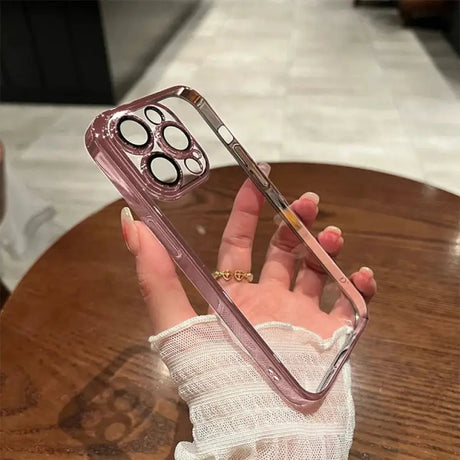 A woman holding a phone case with a pair of glasses on it