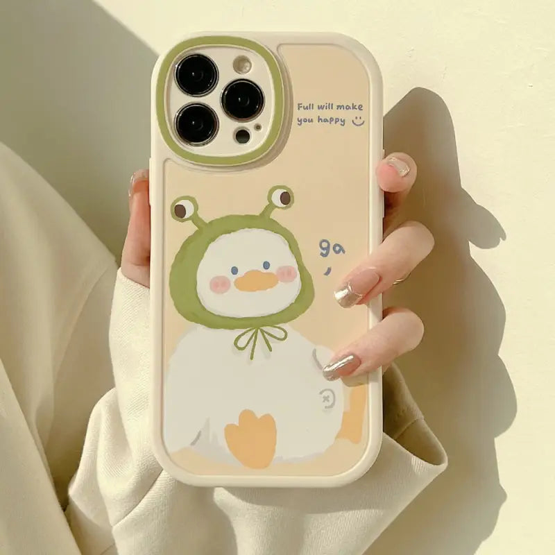 a woman holding a phone case with a penguin on it