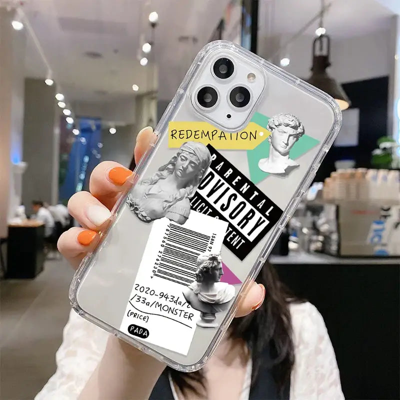 a woman holding up a phone case with a photo of her