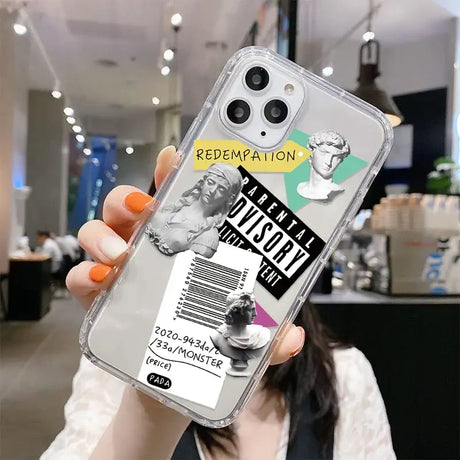 A woman holding up a phone case with a photo of her