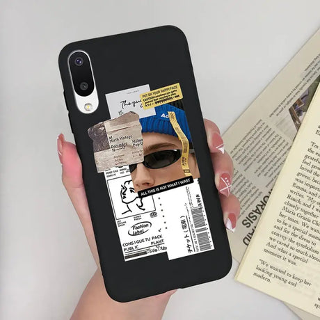 a woman holding a phone case with a photo of her face
