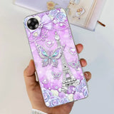 a woman holding a phone case with a purple and white design