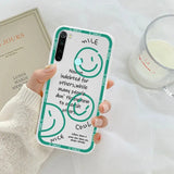 a woman holding a phone case with a quote on it
