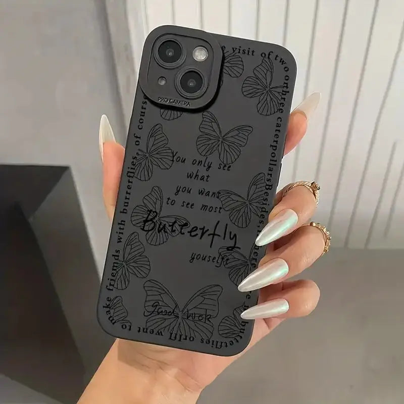 a woman holding a phone case with a quote on it