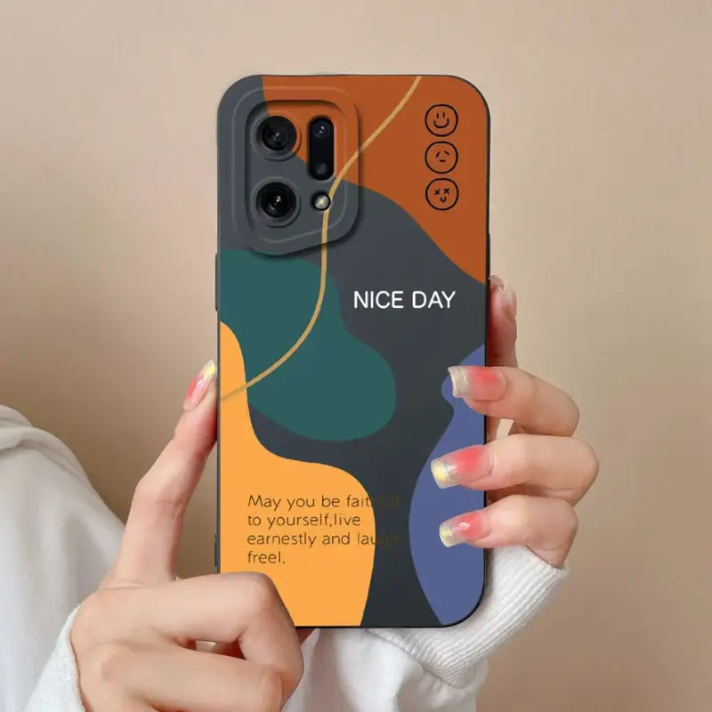 a woman holding up a phone case with a quote on it