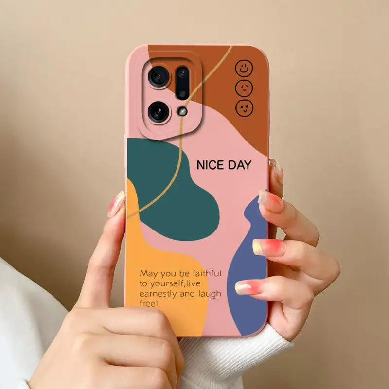 a woman holding a phone case with a quote on it