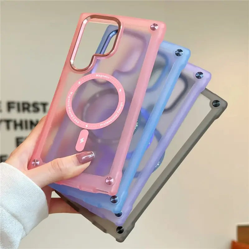 A woman holding a phone case with a ring on it