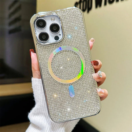 a woman holding a phone case with a ring on it
