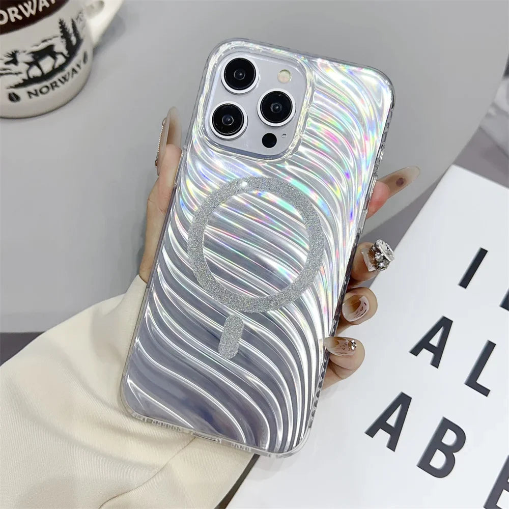 a woman holding a phone case with a silver and silver swirl design