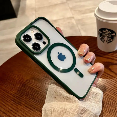 A woman holding a phone case with a starbucks cup in the background