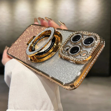 a woman holding a phone case with two rings on it