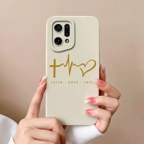 a woman holding a phone case with the word faith hope