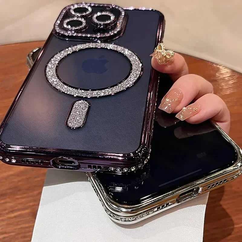 a woman holding a phone with a diamond ring on it