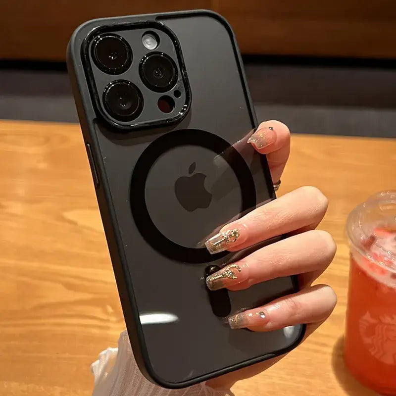 A woman holding a phone with a ring on it