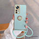 a woman holding a phone with a ring around her neck