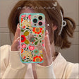 A woman taking a photo of her phone