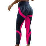 a woman in pink and black workout leggings