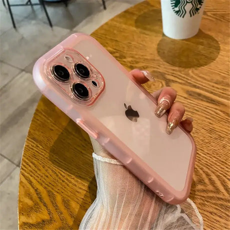 A woman holding a pink iphone case