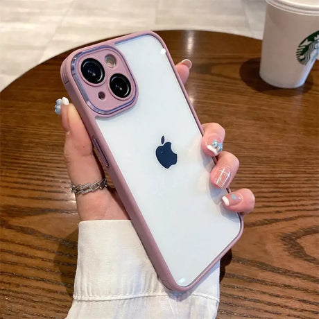 A woman holding a pink iphone case