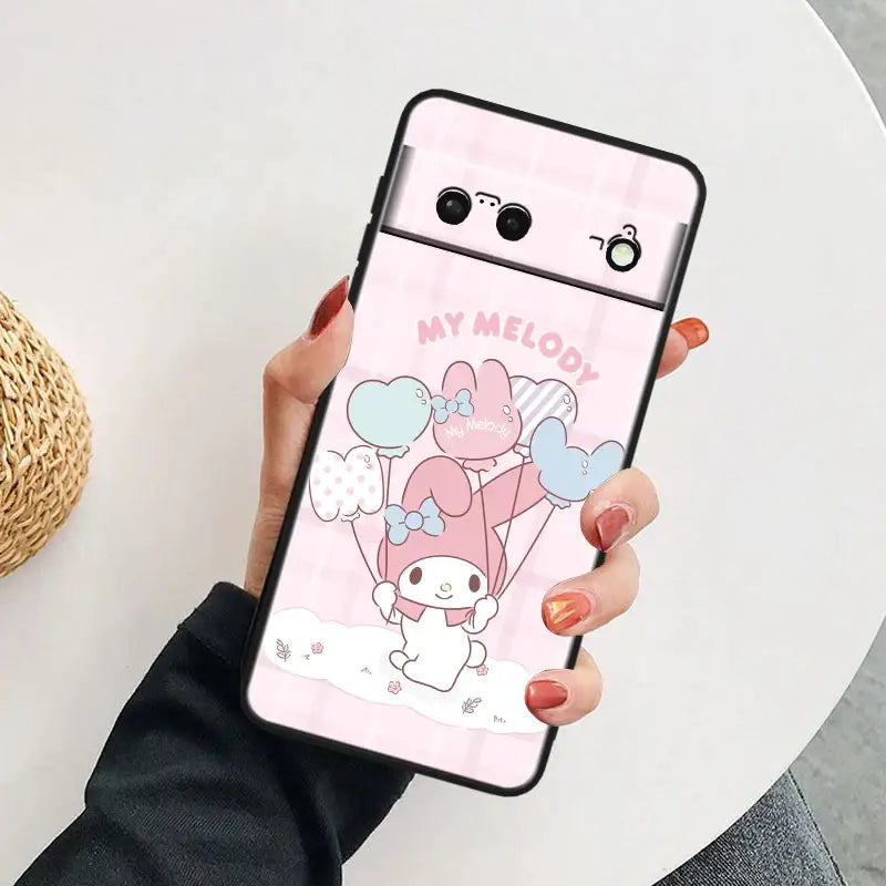 a woman holding a pink phone case with a cute bunny