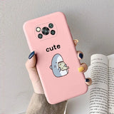 a woman holding a pink samsung s9 case with a cute cat on it