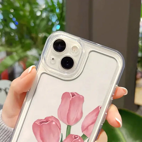 A woman holding a pink tulipa phone case