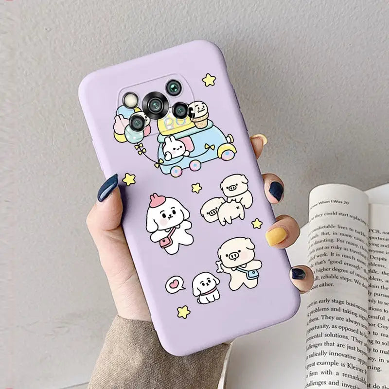 a woman holding a purple phone case with cartoon characters on it