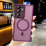 a woman holding up a purple phone case