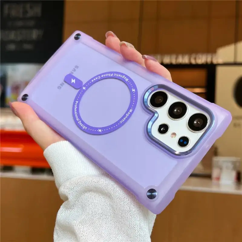 A woman holding a purple phone case