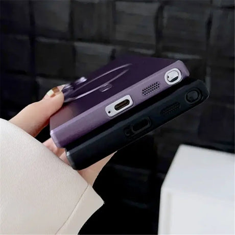 A woman holding a purple phone case