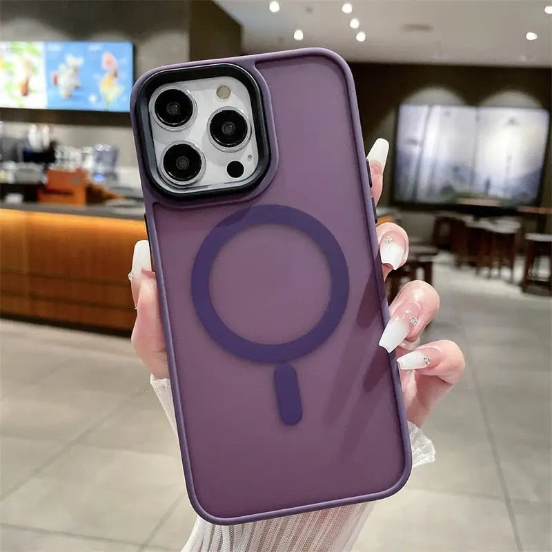 a woman holding a purple phone case with a magni