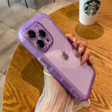 A woman holding a purple phone case