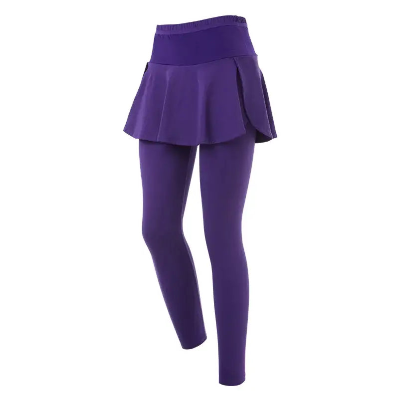 a woman in purple tights and a purple skirt