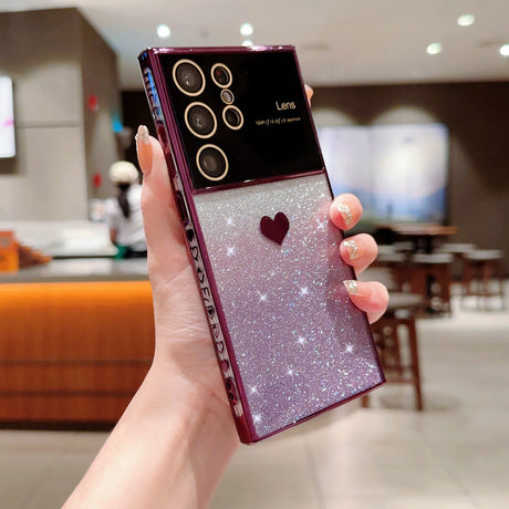 a woman holding a purple and white glitter case