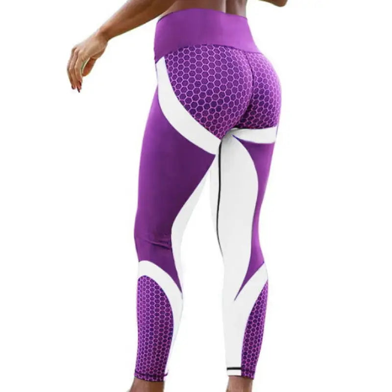 a woman in purple and white workout leggings