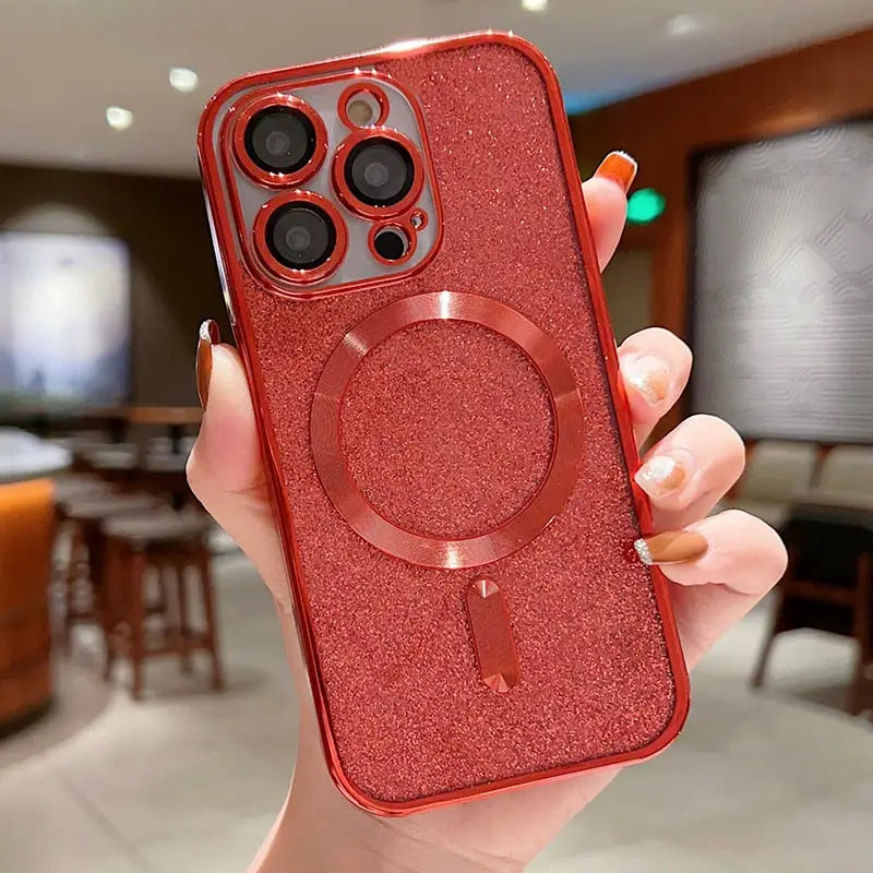 a woman holding a red glitter case with a phone in her hand