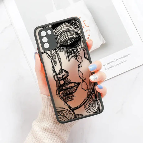 A woman’s face is drawn on a phone case