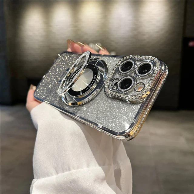 a woman holding a silver case with two rings
